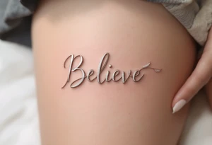 A delicate "Believe" in silver, intertwined with tiny feathers in soft white, symbolizing freedom and trust in the journey. tattoo idea