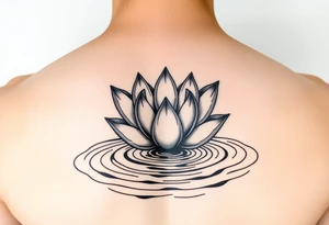 serene lotus flower emerging from sacred waters with ripples tattoo idea