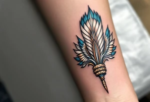 A tribal feather fan in brown, white, and turquoise, held together by leather bindings. tattoo idea