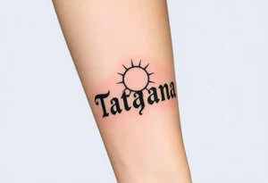 Tatayana name tattoo for a father using old English lettering and sun and moon that starts reading from the wrist to the elbow tattoo idea