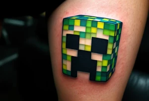 Small Minecraft creeper head block tattoo idea