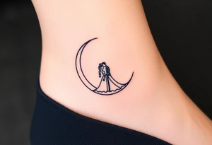 A crescent moon with a bride and groom sitting together on it tattoo idea