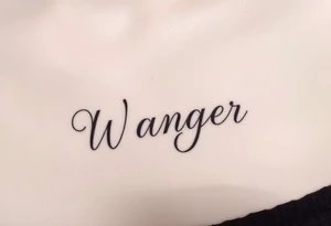 My last name, Wagner, in cursive  font tattoo idea