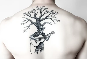 Man with hat
 playing acoustic guitar underneath tree of life concept style tattoo idea