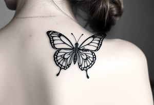 A butterfly with the name “euan” incorporated into it tattoo idea
