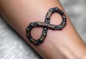 A bicycle chain forming the infinity symbol, in metallic silver and gold, symbolizing endless cycles and eternal connections. tattoo idea