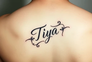 “Tiya” in writing on hand tattoo idea