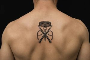 BDSM symbol feminine tattoo idea