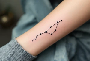 A minimalist Pisces constellation outlined in black with a subtle aquamarine fill captures the intuitive soul of the sign. tattoo idea
