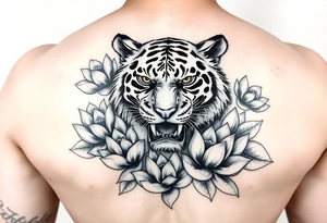 fierce tiger emerging through blooming lotus flowers in mist tattoo idea
