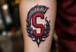A bold red and burgundy "Sparta" with bold “S” crest wrapped in black flames on the forearm. tattoo idea