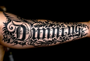 Dunning,on left forearm details include angel wing, greek type of font,jungle leaves , tiger claw scratch tattoo idea