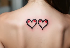 Two half-heart tattoos in black with red tips that form a full heart when side by side. tattoo idea
