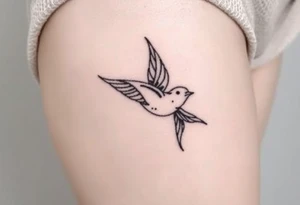 swallow flying with its wings out and forward tattoo idea