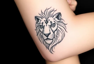 Lion face tattoo idea