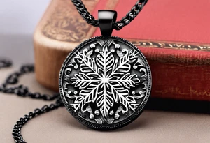 necklace with a simple snowflake pendant tattoo idea