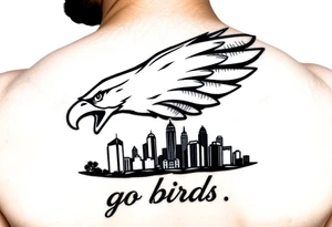 Philadelphia Eagle classic logo flying over Philadelphia city skyline with the words go Birds under it tattoo idea