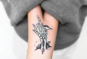 Skeleton hand reaching out of the ocean for a swallow tattoo idea