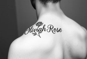 The name Oliviah Rose written as the rose stem spelt as the name
Girl tattoo tattoo idea
