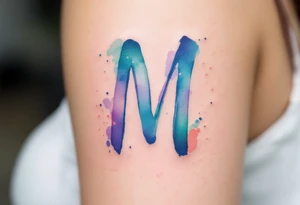 A watercolor "M" in blended shades of teal, lavender, and coral, with a brushstroke effect. tattoo idea
