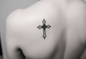Small feminine cross on female wrist tattoo idea