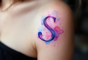 A soft watercolor "S" blending shades of pink, blue, and purple with a dreamy effect. tattoo idea