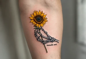 A skeleton hand holding a dying yellow sunflower, quote "memento mori" in thin, winding black cursive along the stem. tattoo idea