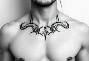 Feminine Tattoo with horns just barley touching collarbone tattoo idea