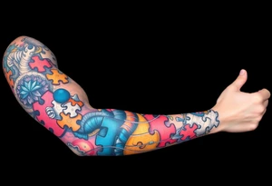 left arm full sleeve to support autism awareness full color and completed filled tattoo idea