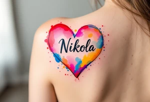 A colorful splashed heart, with vibrant hues of red, pink, blue, and yellow, and the name "Nikola" boldly displayed in a black modern sans-serif font. tattoo idea