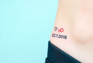 wedding rings tattoo with love and wedding date 22.07.2018 tattoo idea