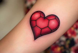 A heart-shaped red soccer ball stitched like leather, symbolizing love for the game. tattoo idea