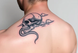 Upper right back to shoulder tattoo of realistic skull with rattlesnake and clouds. No color, except white for highlights. tattoo idea
