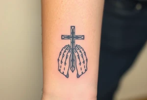 cast all your anxiety on him because he cares for you" with a cross and hands tattoo idea