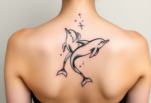 Dolphins swimming on spine tattoo idea