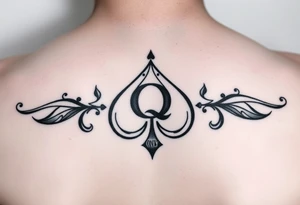 A spade womb tattoo with a Q in the center, with three points around the outside. The first reading, "BLACK". The second reading, "SEED". The third reading, "ONLY". tattoo idea