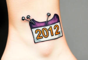 Safety pins through the skin attaching a running bib with 2012 and purple and gold accents tattoo idea