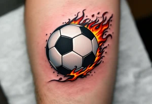A realistic black and white soccer ball with fiery orange and red flames trailing behind it. tattoo idea