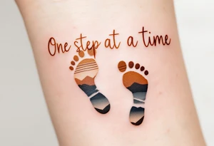 “One step at a time” in warm brown handwritten font with footprint silhouettes fading in earthy tones. tattoo idea