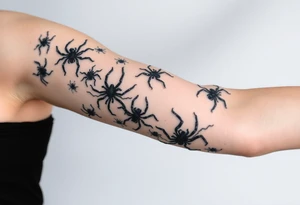 Spiders crawling down arm tattoo idea