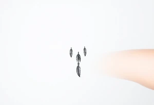 native dreamcatcher with flowing feathers and sacred beads tattoo idea