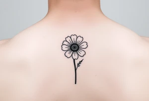 Minimalists marigold flower with g tattoo idea