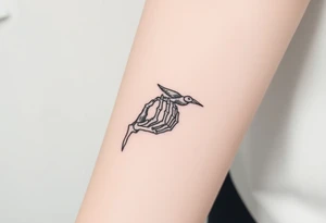 Skeleton hand reaching out of the ocean for a flying swallow tattoo idea