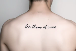 Small Fine line dainty cursive tattoo with the saying “let them & let me” on back tattoo idea