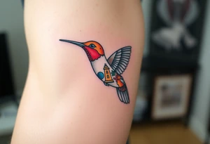 A hummingbird made of sand and hieroglyphs(only red , blue and black are possible colors) tattoo idea