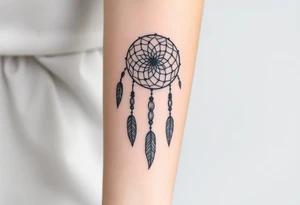native dreamcatcher with flowing feathers and sacred beads tattoo idea