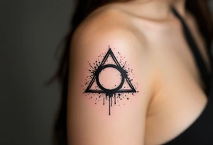 An ink-drip triquetra, with deep black edges fading into an artistic splatter effect tattoo idea