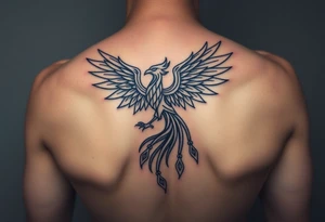 magnificent phoenix rising from golden flames with trailing embers tattoo idea