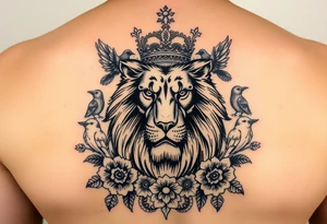 powerful majestic lion with a crown, surrounded by floral ornaments and birds tattoo idea