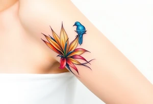 Bird of paradise flower with blue bird tattoo idea
